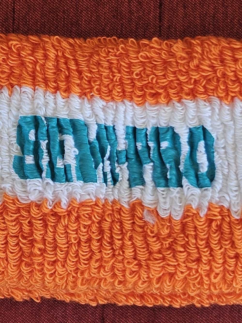 Orange and White Knit Beanie with Teal Accent